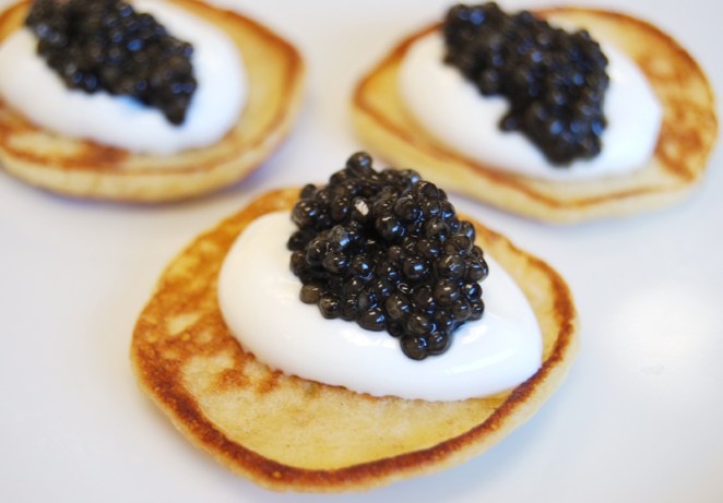 Buttery blini make a tasty cushion for our French ossetra caviar.