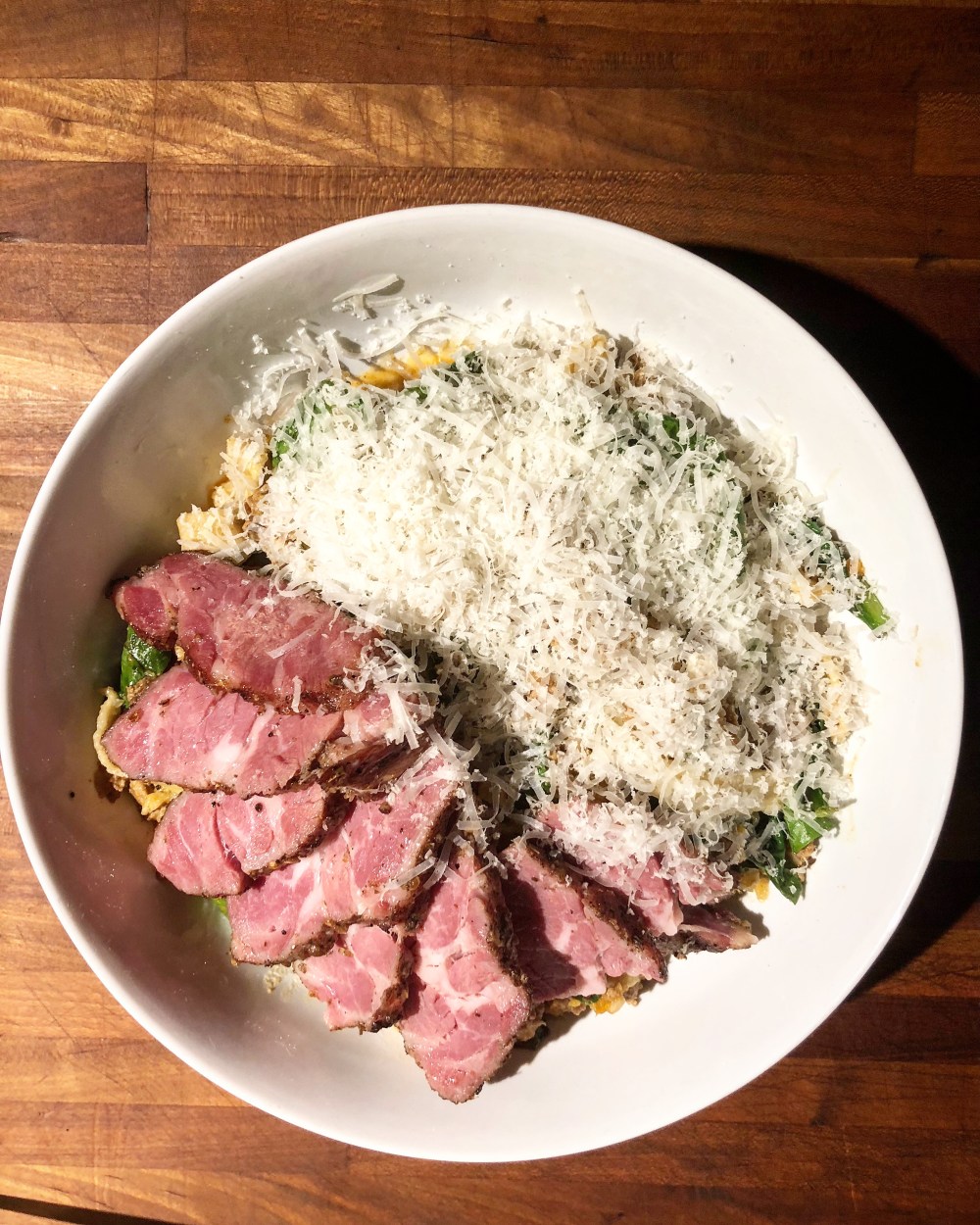 Lamb bolognese, Michigan rye fettuccine, greens, parmigiana reggiano, House lamb neck pastrami. Mabel Gray
